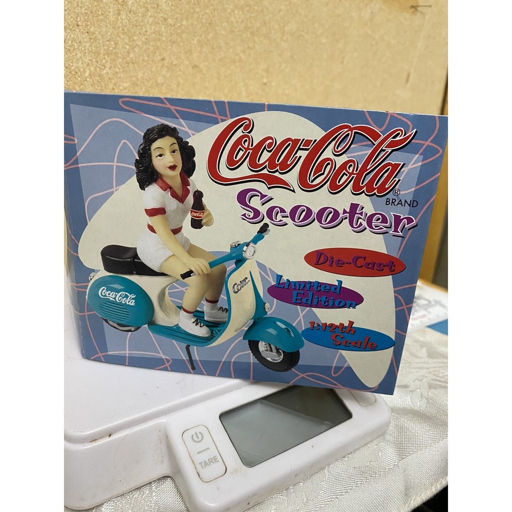Coca Cola Vintage Scooter With Woman Holding Coke. Limited edition #‎ 02079